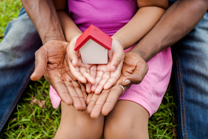 NAREB Minority Homeownership Hands of Father and Child