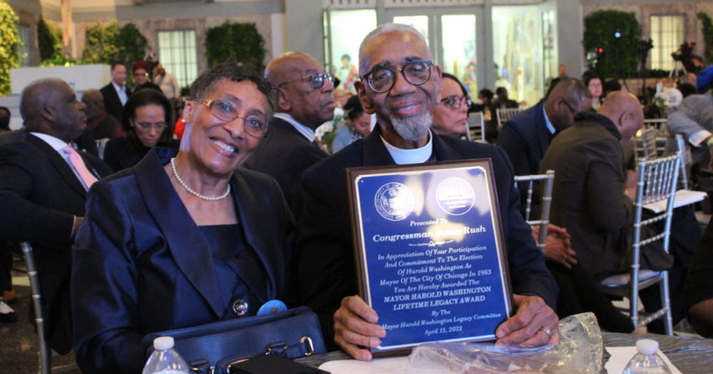 U.S. Congressman Rush and wife, Rev. Paulette Holloway, holding his Mayor Harold Washington Legacy Lifetime Award.