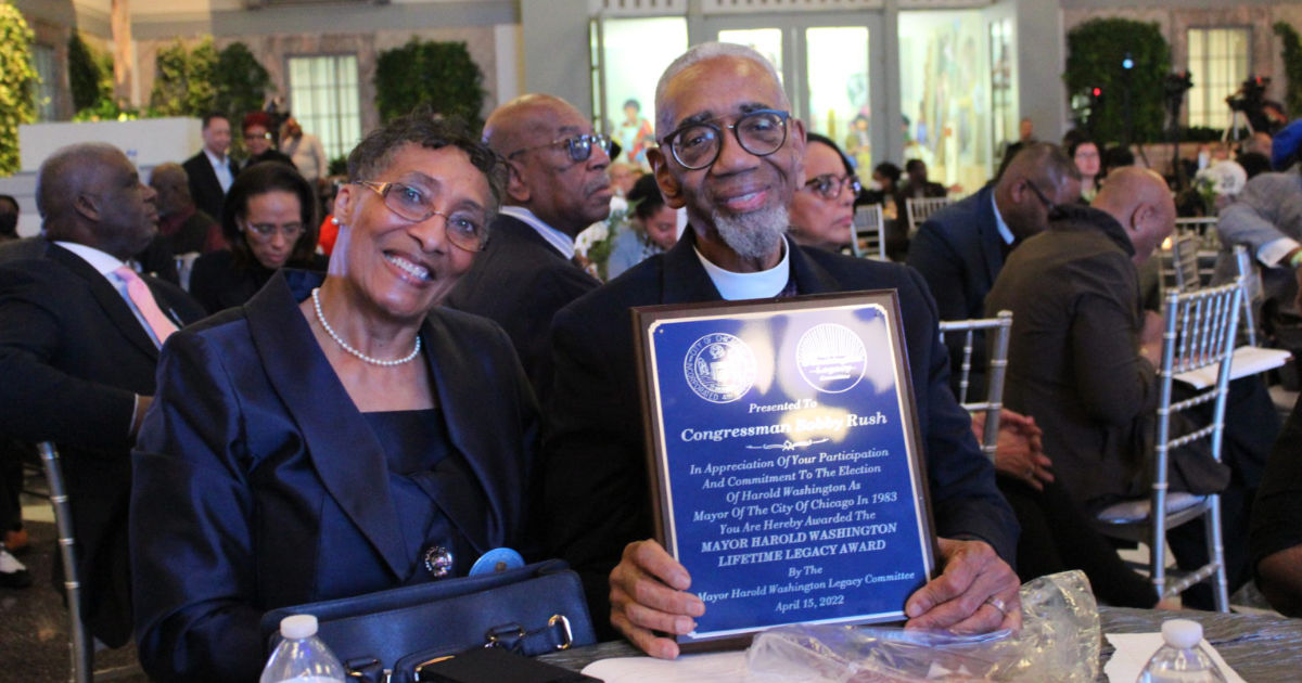 U.S. Congressman Rush and wife, Rev. Paulette Holloway, holding his Mayor Harold Washington Legacy Lifetime Award.