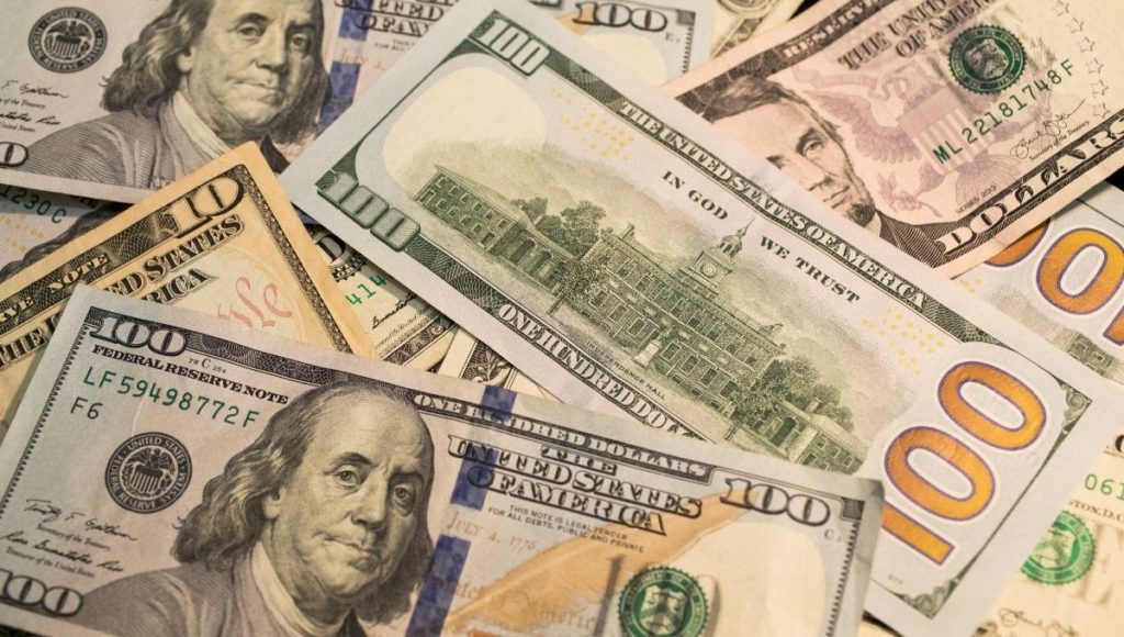 close up of several hundred dollar bills