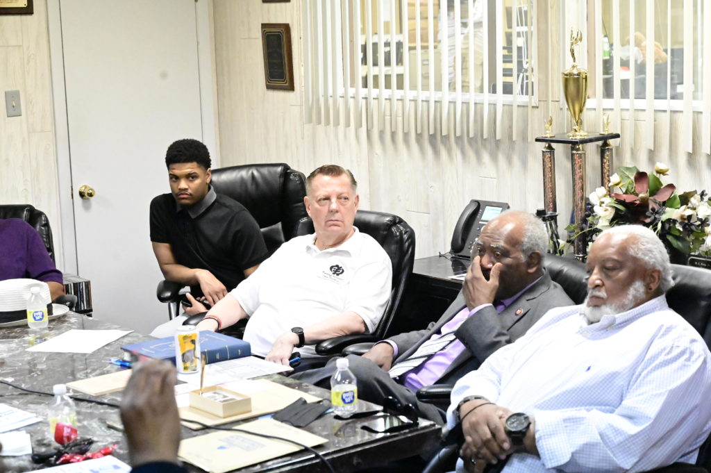 Pictured from L-R: Father Michael Pfleger, U.S. Congressman Danny K. Davis and Eddie S. Read, Chairman of Chicago Black United Communities.