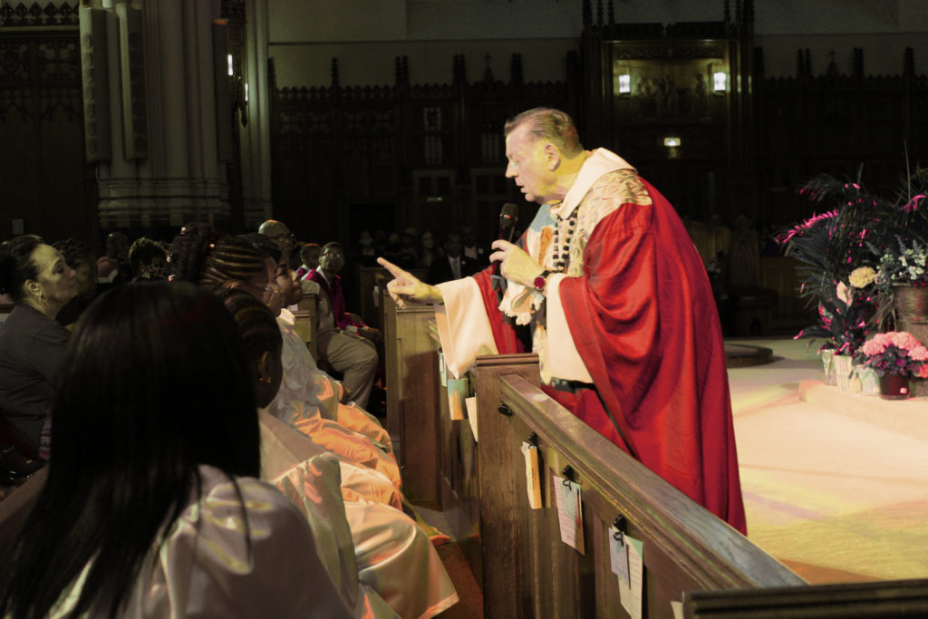 ADDRESSING THE 2022 Saint Sabina Academy eighth grade graduates on Sunday, May 22, his 73rd birthday, Father Michael Pfleger confessed to his decision nearly a year ago to commit suicide while exiled from the church. He had been falsely accused of having sex with two Black Texas brothers but was later cleared of all the allegations. Had he gone through with the suicide it would have been an example of how making one bad decision could change your life forever. (Photo by Chinta Strausberg