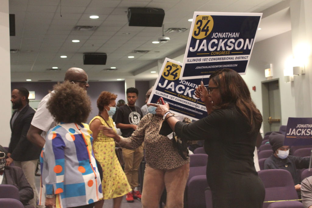Dorothy Brown, Mrs. Jackson and a crowd following the meeting (Photo by Chinta Strausburg)