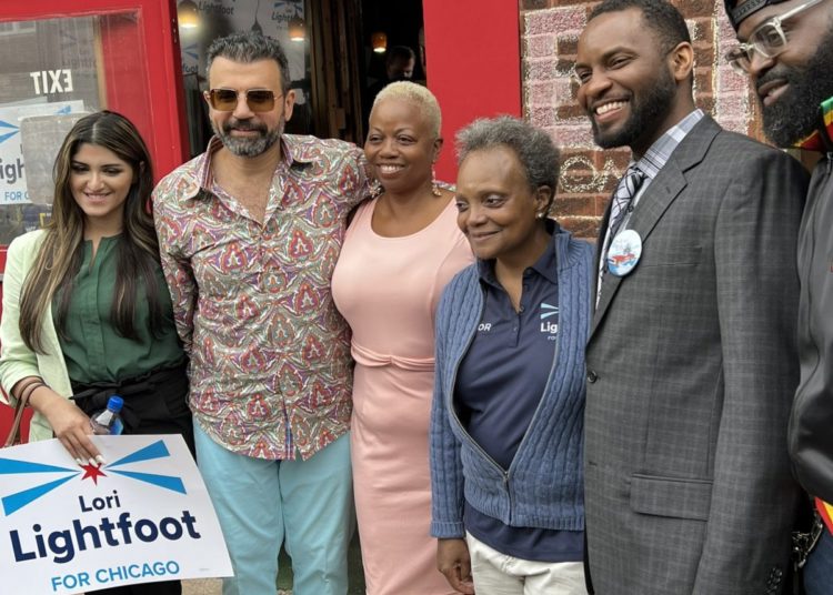 Mayor Lori Lightfoot poses with local business owners outside of Brown Sugar Bakery during her campaign kick-off Grand Crossing tour event. (Photos courtesy Lori Lightfoot Twitter)