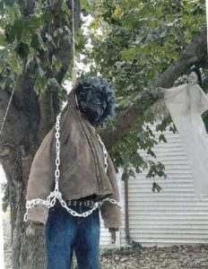 A CLOSE UP of the mannequin that was hanged by a white mother and her adult son in order to intimidate their Black neighbor.