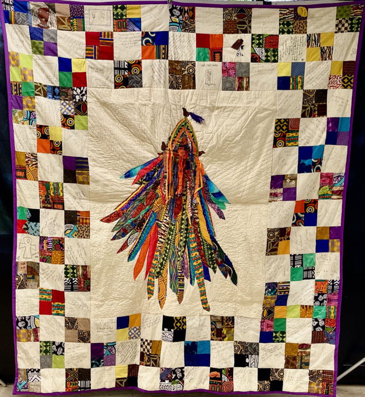 PREMIER “COMMUNITY QUILT” created 1999 by Reneau Diallo, co-founder of the African Festival of the Arts Quilt Pavilion. (Photo by D. Crable)