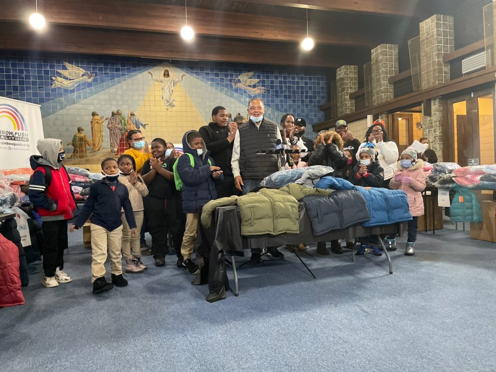 REV. JACKSON GIVES AWAY 300 COATS TO CONCORDIA PLACE CHILDREN