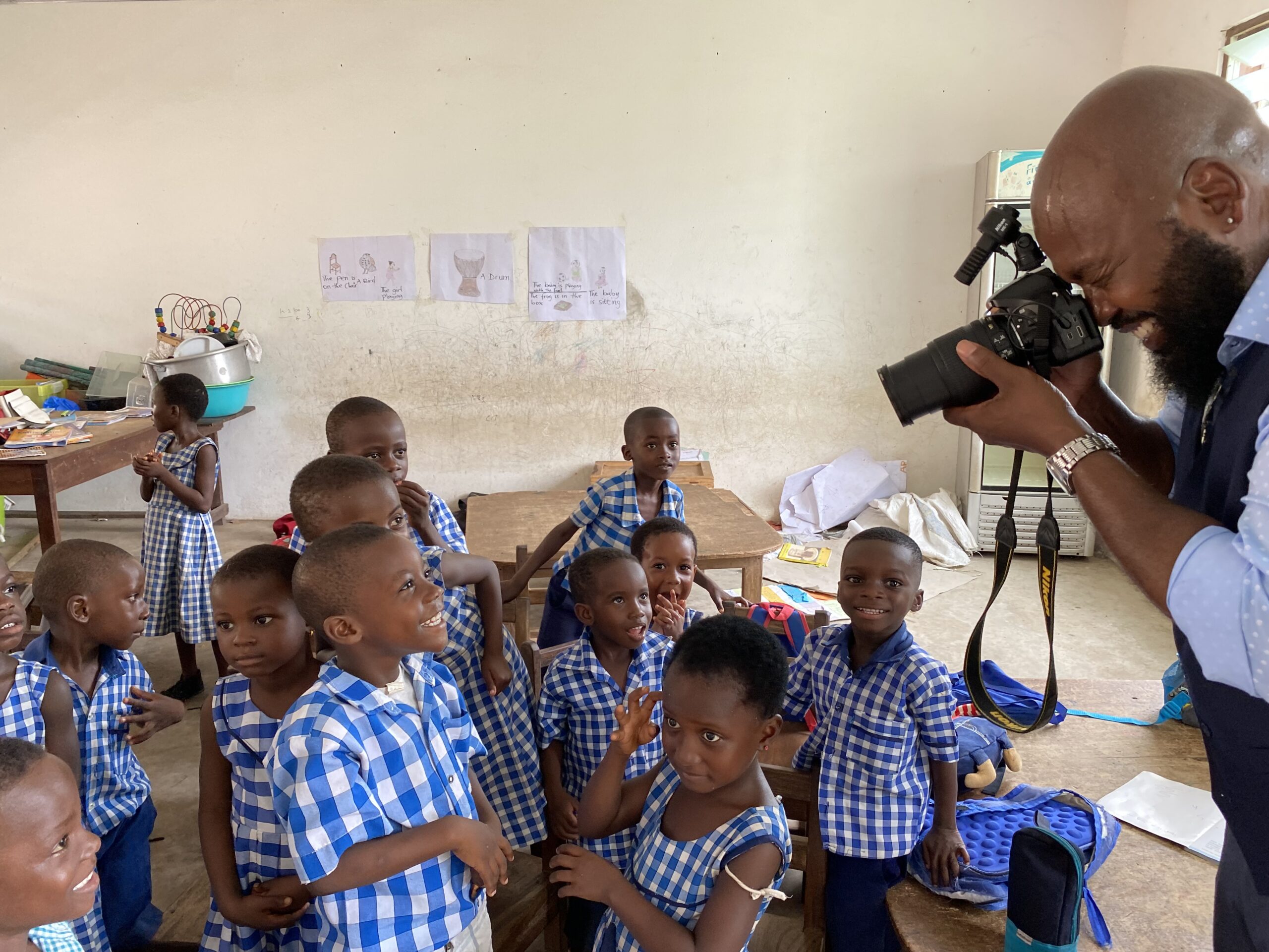 JOHN FOUNTAIN CAPTURES the faces of children at an orphanage in Ghana, where he was a 2021-22 Fulbright scholar. (Photo: Monica Fountain)