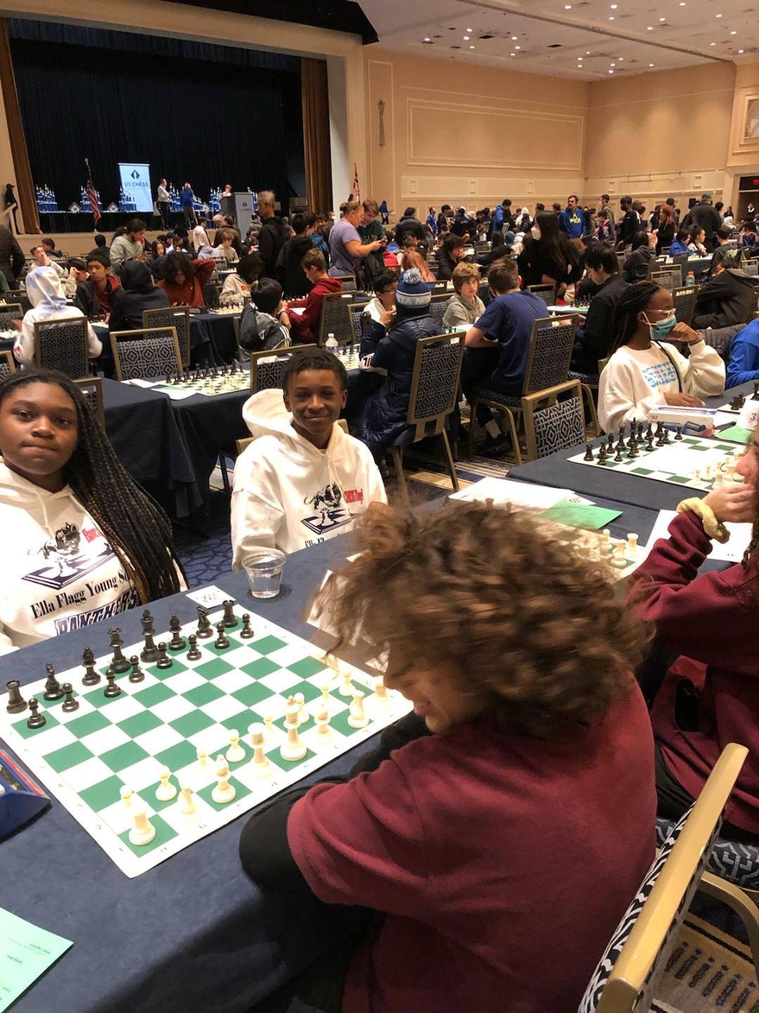 JOSEPH OCOL TEACHES middle school at the Ella Flagg Young Elementary School, 1434 N. Parkside Ave., Chicago, IL, where he has begun a chess club for disadvantaged Black seventh and eighth grade students. On Saturday, March 11, 2023, his students won second place during the CPS K-8 chess playoffs held at the Solorio Academy High School. Last month, his students ranked 10th place out of 60 schools and they were the only ones from CPS in the state tournament. They need funding to go to Washington, D.C. for the national competition.