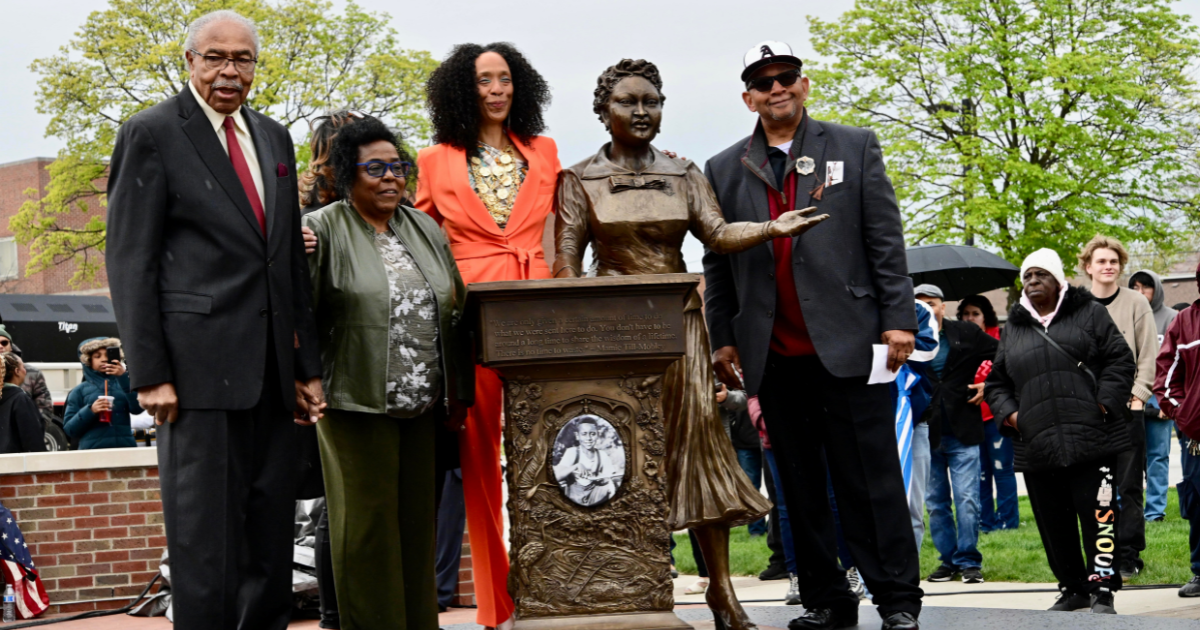 THE FAMILY OF Mamie Till-Mobley poses with the artist after the unveiling of the life-size statue of civil rights activist Mamie Till-Mobley at Argo Community High School in Summit, Illinois on April 29, 2023. From l-r: Reverend Wheeler Parker, Jr. and his wife, Dr. Marvel Parker; Sonja Henderson, artist; and Dallas Anderson, community leader. (Photos by Marcus Robinson)