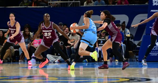 Chicago Sky rookie Sydney Taylor (12) drives between Toronto defenders during the Sky's 97-85 win at Wintrust Arena.  Taylor scored 18 points, grabbed six rebounds and added four assists. (Photo by Marcus Robinson)
