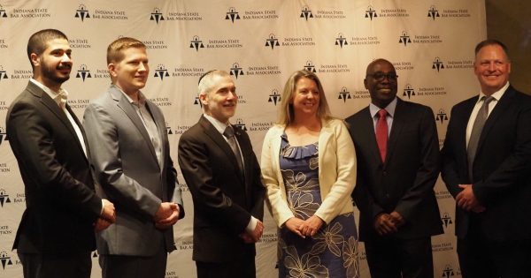 PURDUE GLOBAL LAW School had its first five graduates pass the bar and take their attorney’s oath on May 20, 2025. The Dean of the Law School, Martin Pritikin (third from left), posed with the new lawyers. (Madelyn Hanes/Indiana Capital Chronicle)