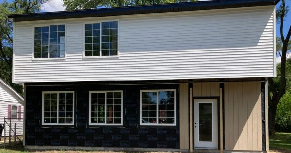 SINGLE-FAMILY RESIDENCE under construction at 5544 E. 10th Avenue; the first
new home in Aetna in decades.